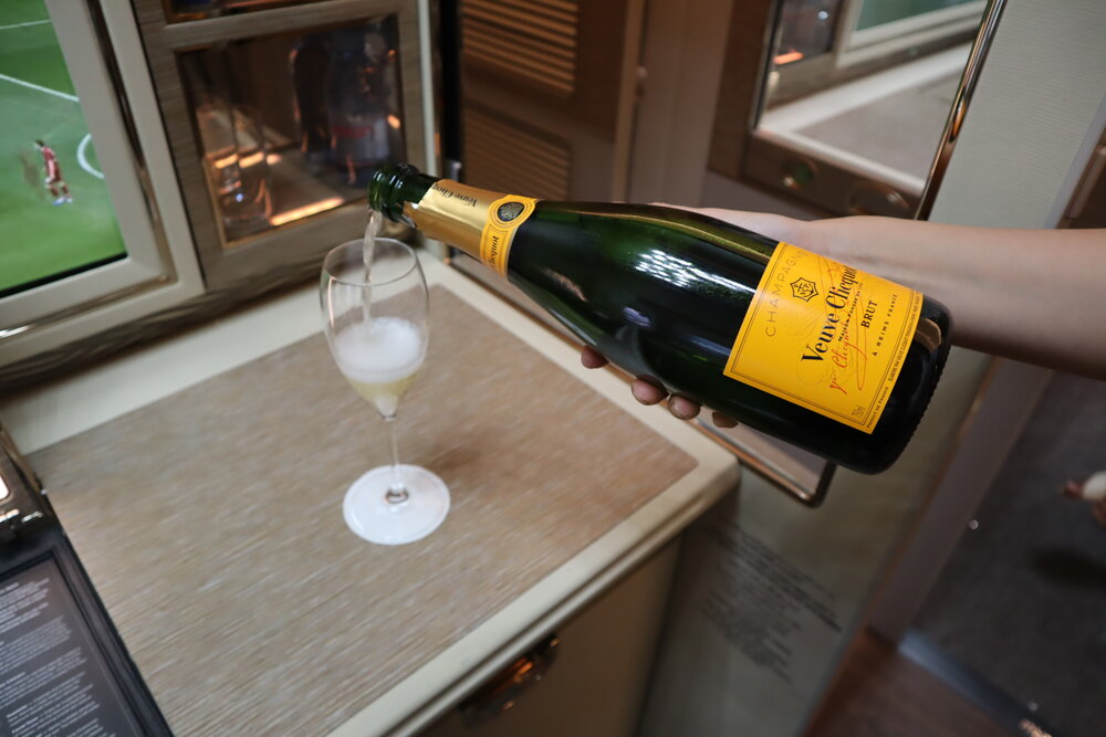 Emirates 777 New First Class – Veuve Cliquot welcome champagne