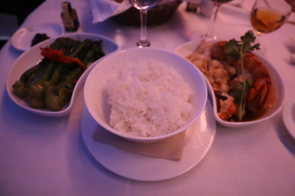 Cathay Pacific First Class – Stir-fried lobster with rice and gai lan