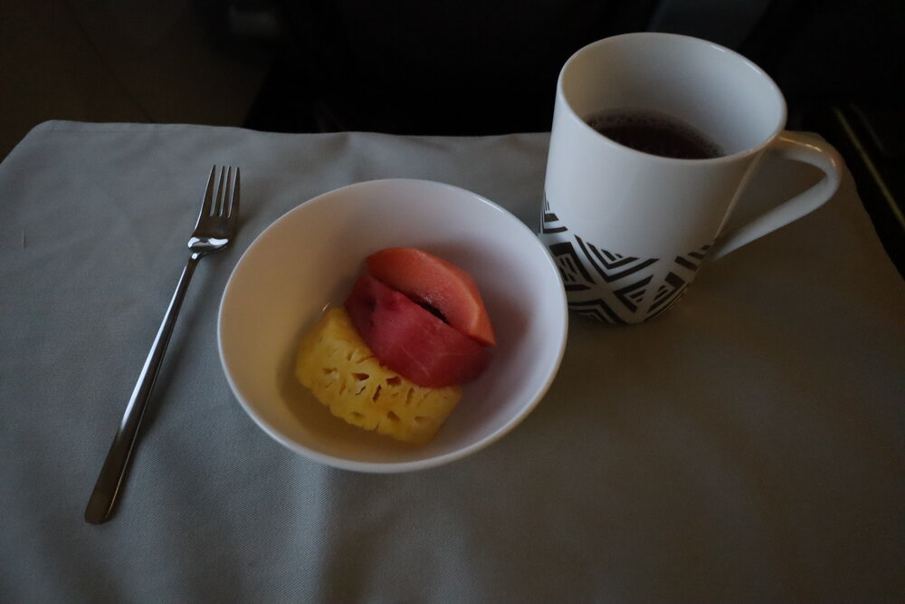 Fiji Airways 737 business class – Fruit plate and tea