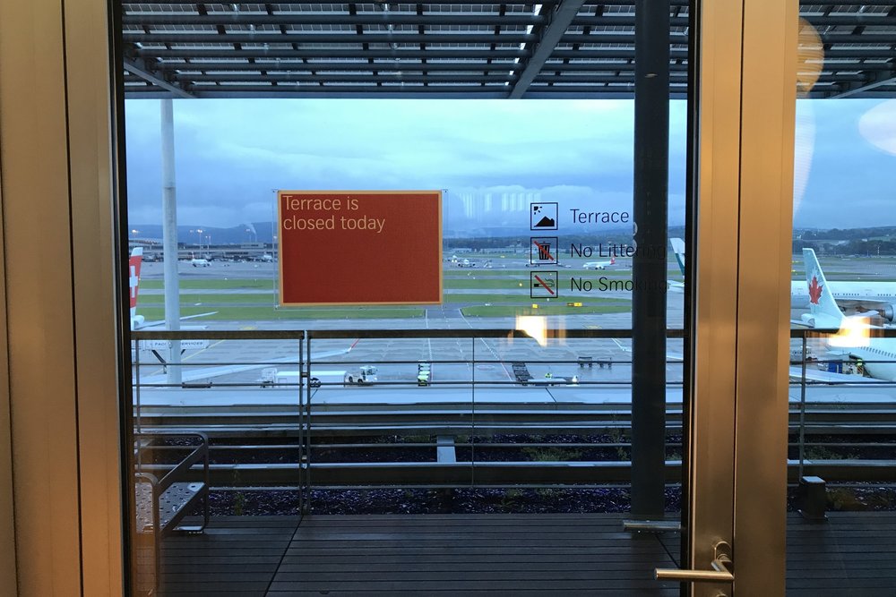 Swiss First Class Lounge Zurich – Terrace sign