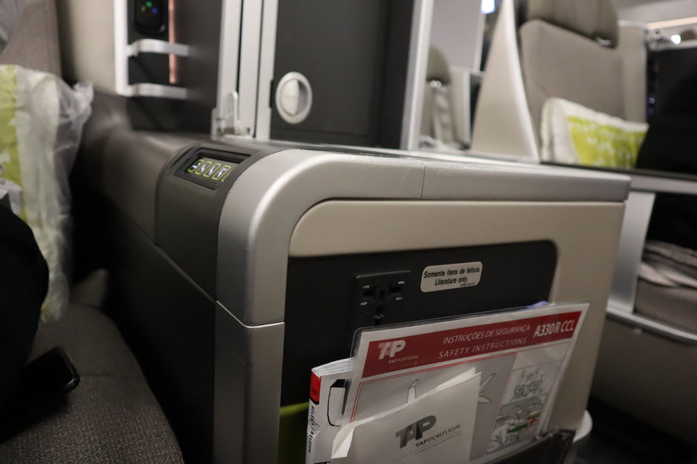 TAP Air Portugal business class – Power port and literature pocket