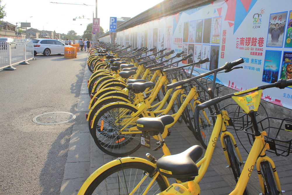 Dozens of Ofo bicycles parked in Nanluoguxiang, Beijing