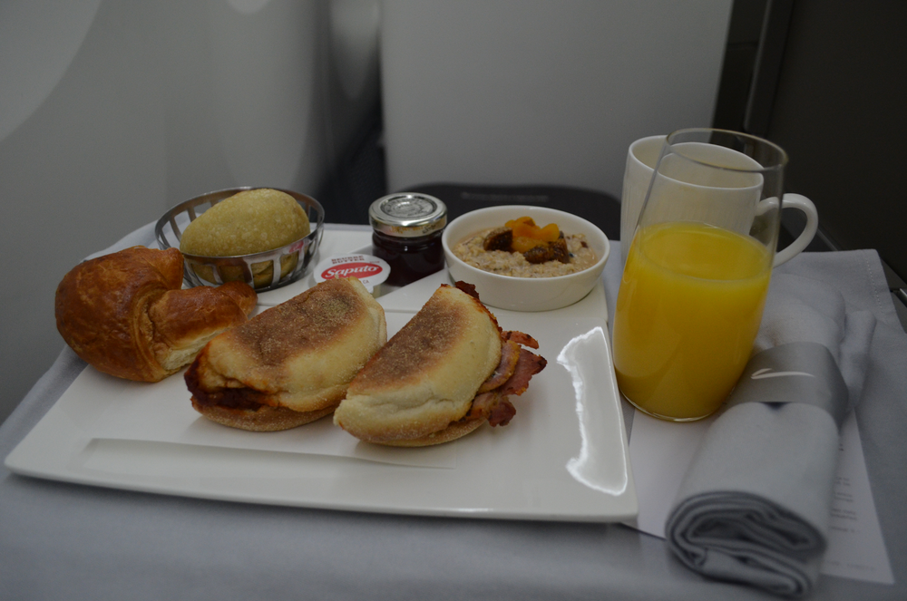 British Airways 787 business class – Croissant, bacon sandwich, and muesli