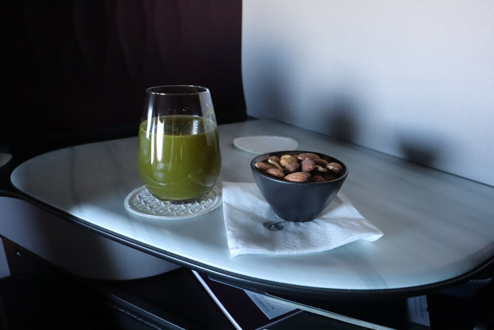 Qatar Airways 777 Qsuites business class – Cucumber, apple, and mint energizer