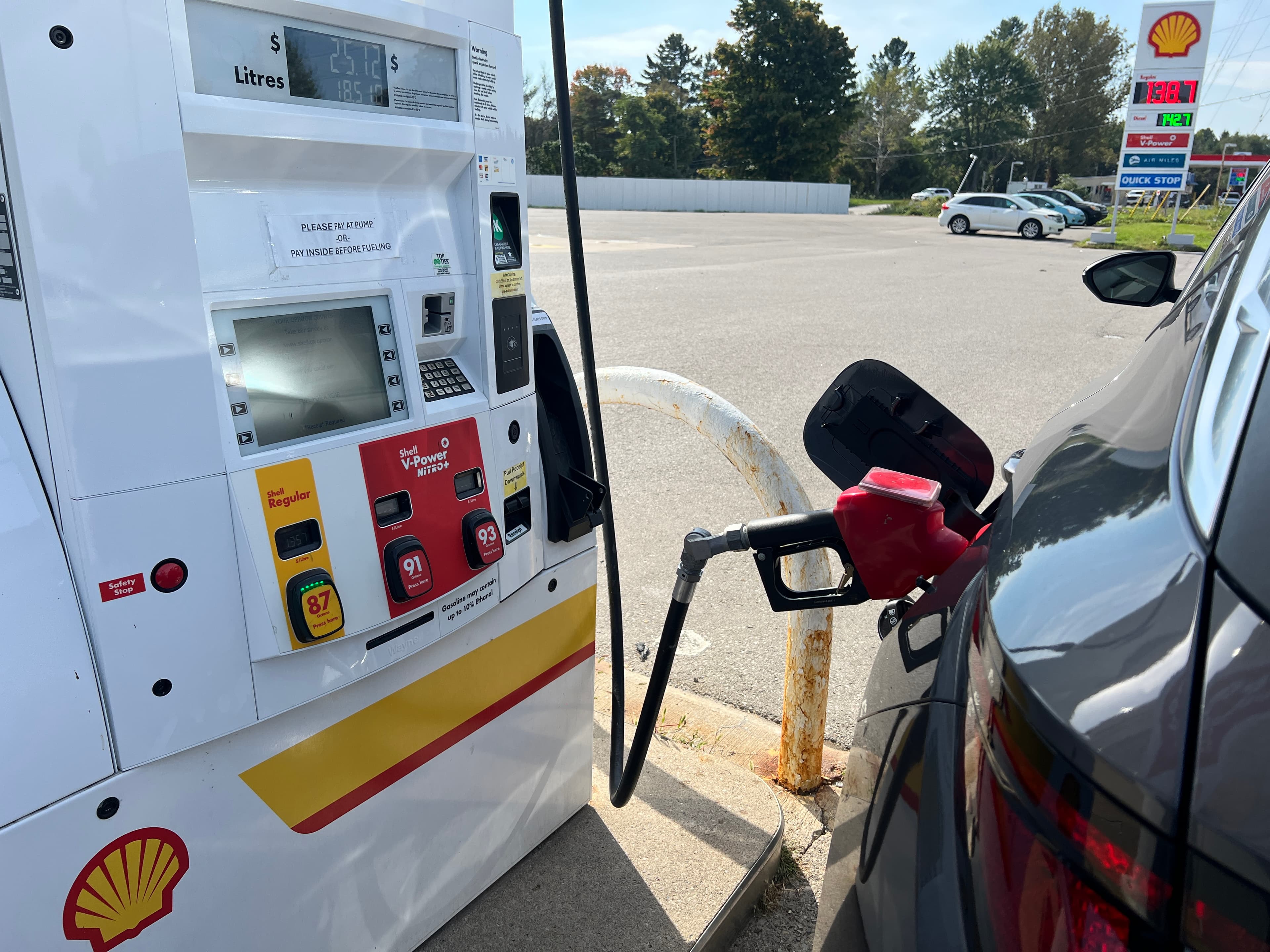 Filling up at a gas station