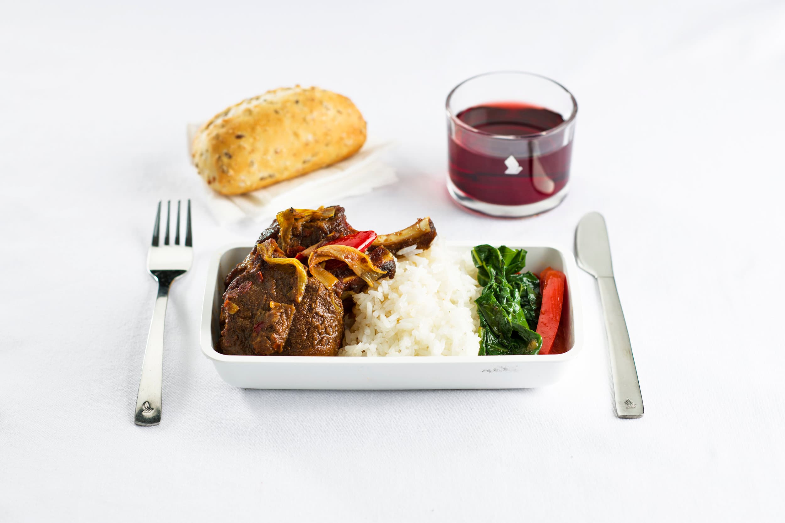 lamb with chilli and cumin jasmine rice and stir fried gai lan