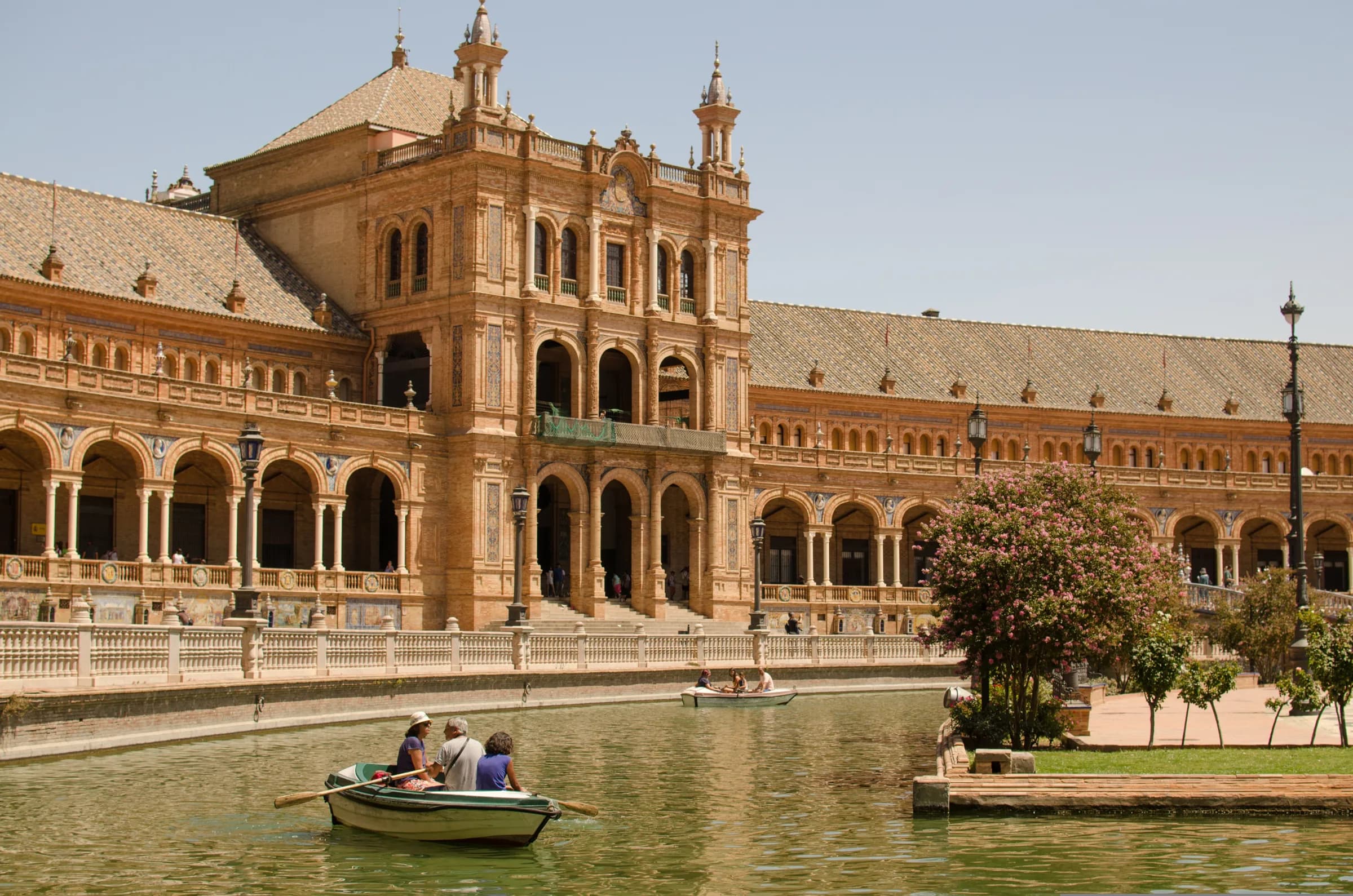 Plaza de España in Seville, Spain, with rowboats on the canal