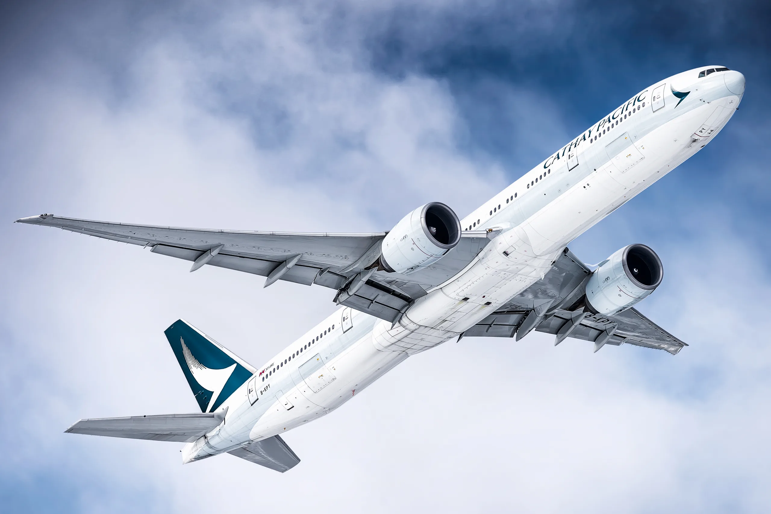 cathay pacific add travel insurance
