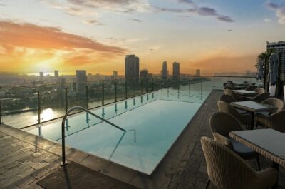 VN102 P0062 Wink Rooftop Pool Sunset.16x9